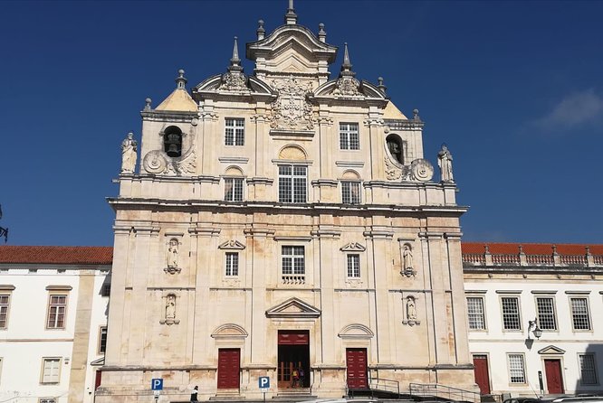Aveiro and Coimbra Small Group Tour with Moliceiro Boat Cruise - Costa Nova: Quick Stop, Striped Houses, and a Coastal Reset