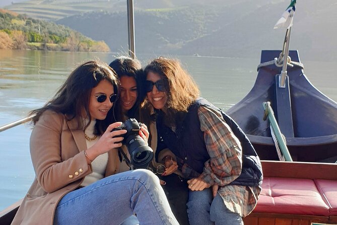 Douro Valley-Expert Guide-Boat-Lunch-Tastings-Offer wine bottle - The National Road 222 return ride with Douro River views