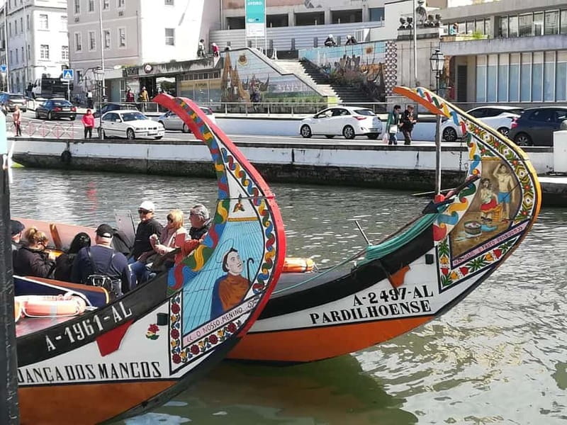 From Porto: Aveiro & Coimbra Tour with Moliceiro Boat Cruise - Old Cathedral and New Cathedral stops: two styles, one city feeling