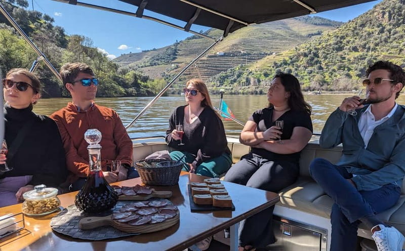 From Porto: Tastings at 2 Wineries, Chef's Lunch & Boat Tour - 11 tastings, including DOC wine and Vintage Port opened by flame