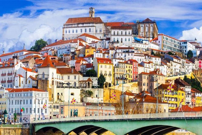 Full Day Tour from Porto to Coimbra and Aveiro with River Cruise - Costa Nova’s Fish Market Village: A Very Local Pause