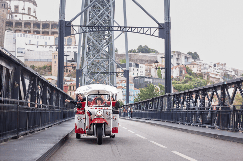 Oporto Tuk-Tuk Tour: Fast, Fun & Flexible – 1H to Full Day! - Clérigos Tower and Praça da Batalha: landmarks with timing built in