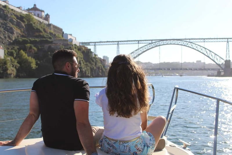 Porto: 6 Bridges Yacht Cruise with Local Wine & Snacks - From Freixo Marina: welcome drink, towels, and a calm start