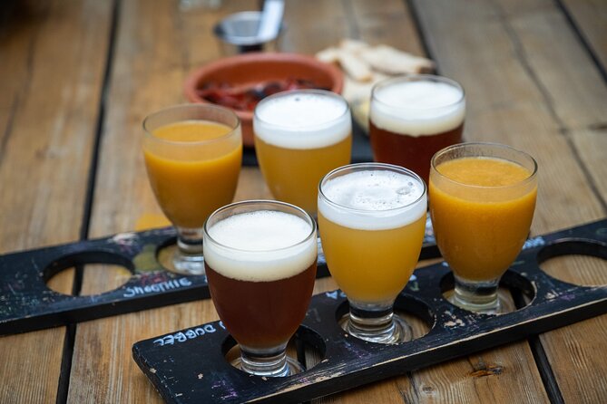 Porto Craft Beer Tour: 7 Beers + 3 Food Pairings in a Small Group - Stop 1: Armazém da Cerveja (The Beer Warehouse Vibe)