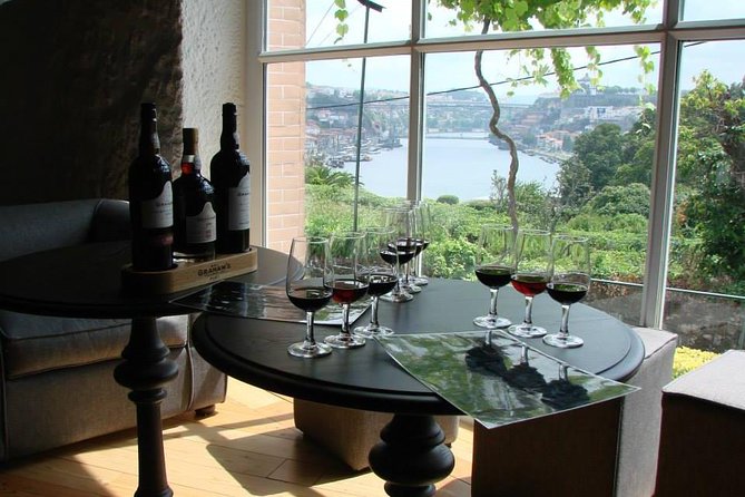 Porto Full Day City Tour Wine Tasting and Six Bridges Cruise - Vila Nova de Gaia Port lodge visit: three wines plus the production story