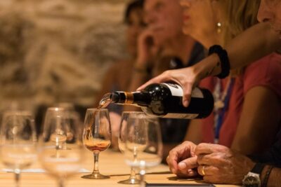 Porto: Guided Tour and Tasting of 3 Port Wines at Poças - Entering the ageing cellars: where Port turns into its style