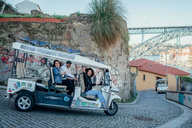 Porto Tuk Tuk: Clérigos, Seaside & Viewpoints - with Options - Historic Bridge Moment: Luis I and Maria Pia (What You’ll Learn While Passing)