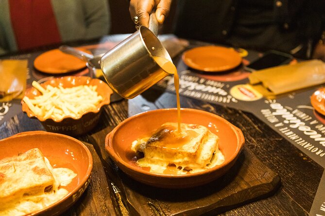 Porto Wine & Dine: Port Wine Cave Food Tour with Eating Europe - Rua Cândido dos Reis: bacalhau and the kind of place you’d miss alone