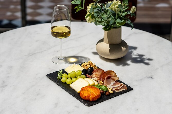 Porto Wine Tasting Experience with Portuguese Tapas Plate - Pairing Tapas Like a Local: Cheese, Cured Ham, Crackers, Jam