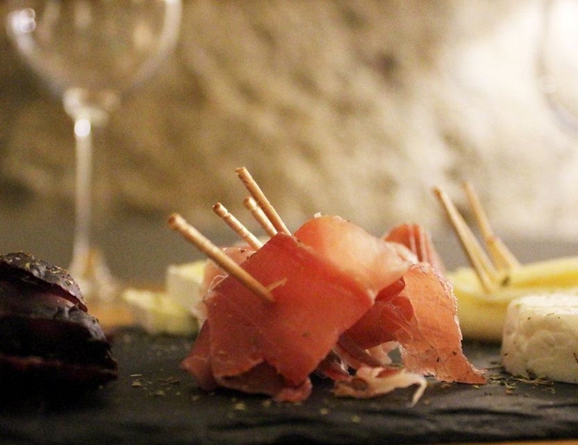 Porto: Wine Tasting with Tapas Walking Tour - Tapas and pairings: codfish cakes, cheese, and the right kind of food